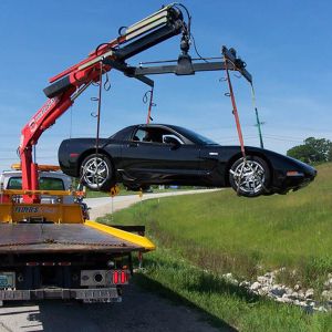 Car Towing with Knuckle Boom Crane