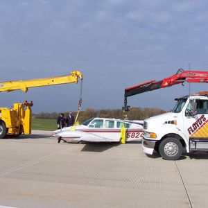Transporting Plane with Knuckle Boom Crane