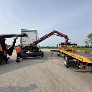 Semi Repair with Knuckle Boom Crane